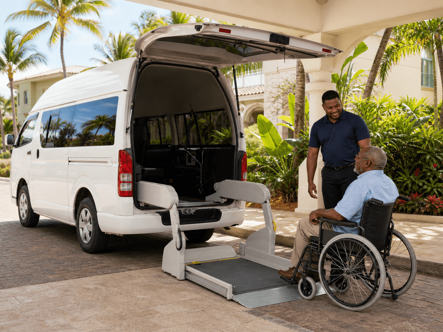 Blessed Rentals driver preparing to assist a wheelchair passenger into an accessible van
